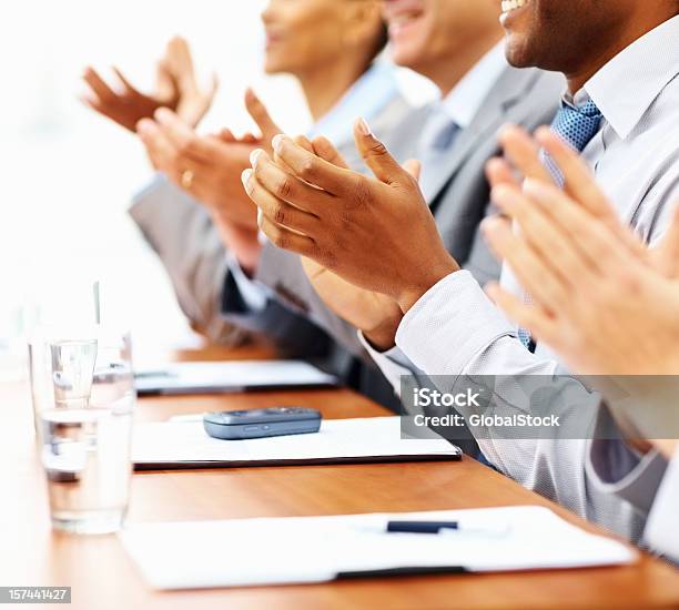 Group Of Busines Colleagues Clapping Hands Stock Photo - Download Image Now - Adult, Adults Only, Applauding