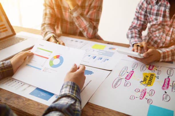 istock Businessmen team in conference room are introducing and consulting each other to make good business profits. concept of mentoring and consulting between investor to exchange knowledge. 1574416828