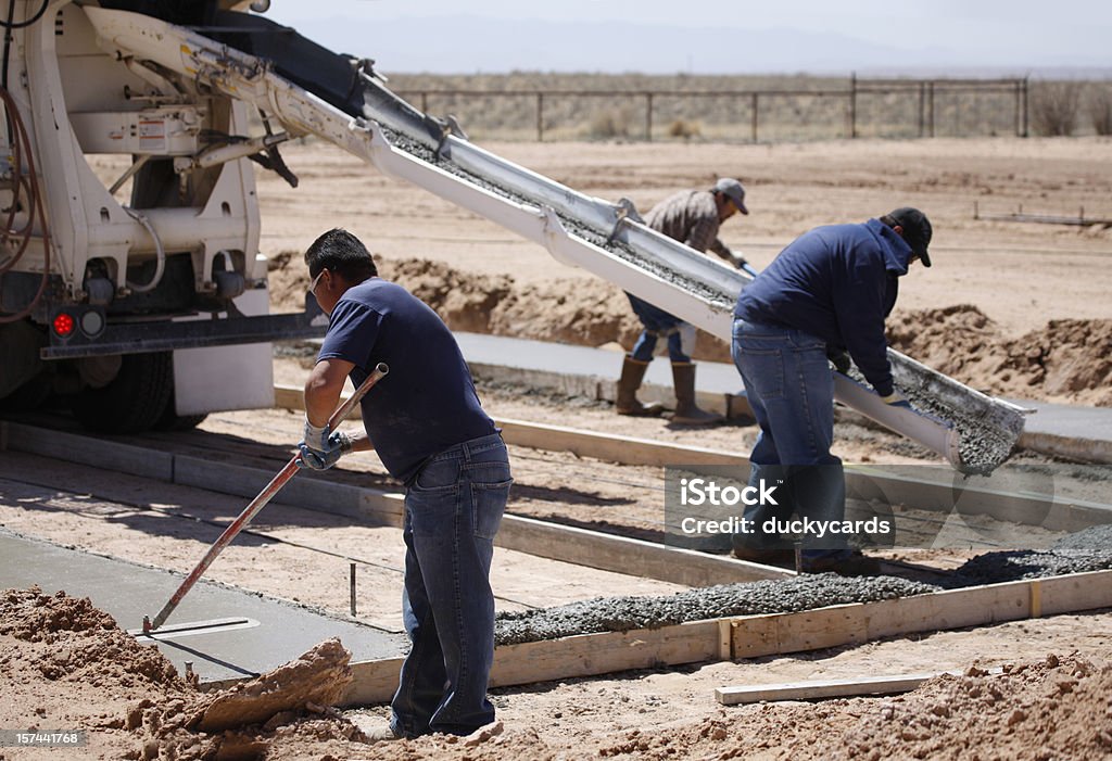 Pouring Cement for a Home Foundation  Cement Truck Stock Photo