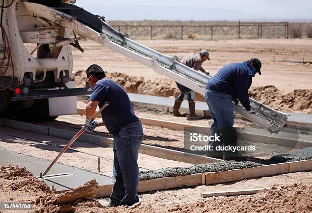 Pouring Cement For A Home Foundation Stock Photo - Download Image Now - Cement Truck, Concrete, Construction Site