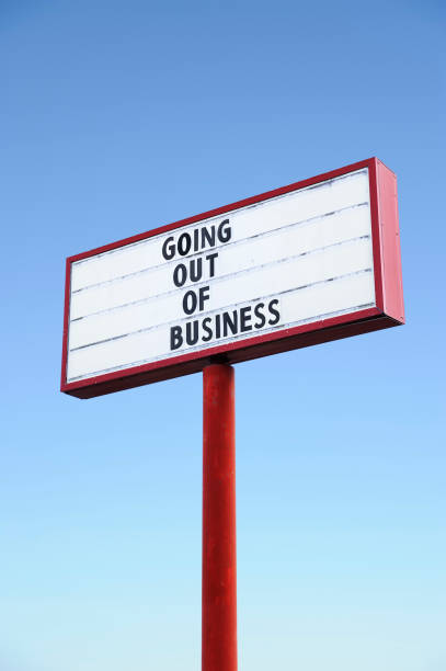 Going out of business sign on shoe store window