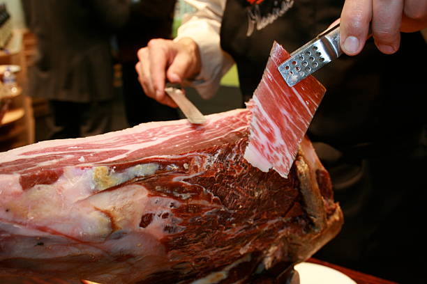 Cutting ham stock photo