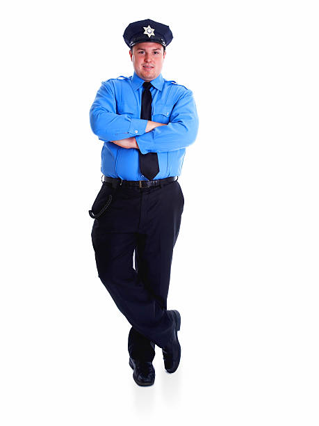 Handsome middle age mature man wearing police uniform standing backwards looking away with arms on body