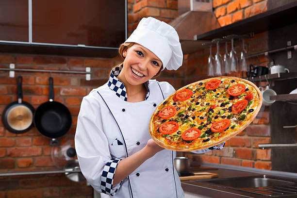 Girls with a pizza stock photo