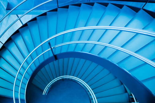 blue, round staircase, modern office interior. 