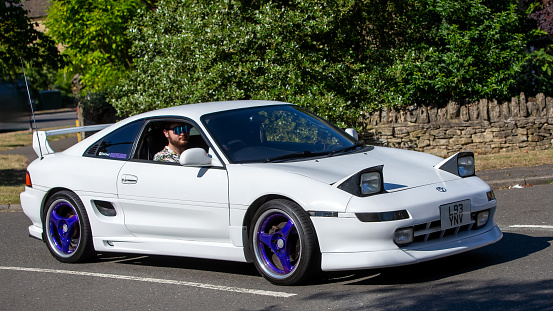 Dunsfold, UK - August 26, 2017: Collection of Mitsubishi Lancer Evolution sports-cars at a gathering of classic and modern vehicles in Dunsfold, UK