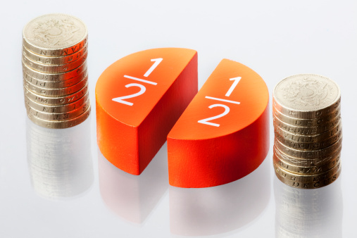 half and half- pound coins divided into two piles