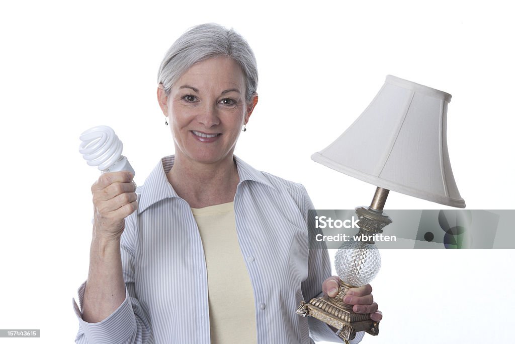 Frau mit energiesparende Glühbirne (XXL - Lizenzfrei 40-44 Jahre Stock-Foto
