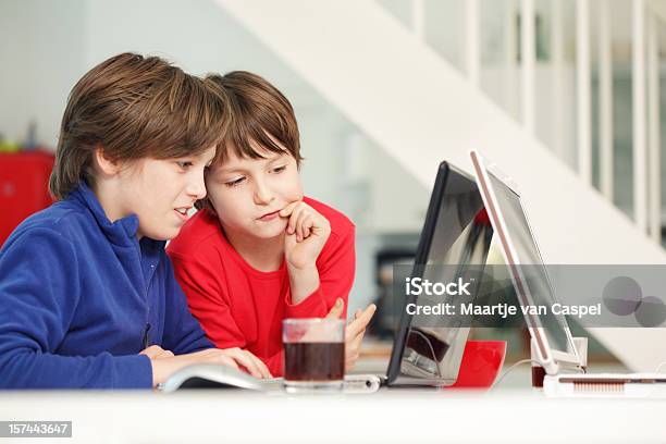 Children And Laptop Stock Photo - Download Image Now - 10-11 Years, 8-9 Years, Blue