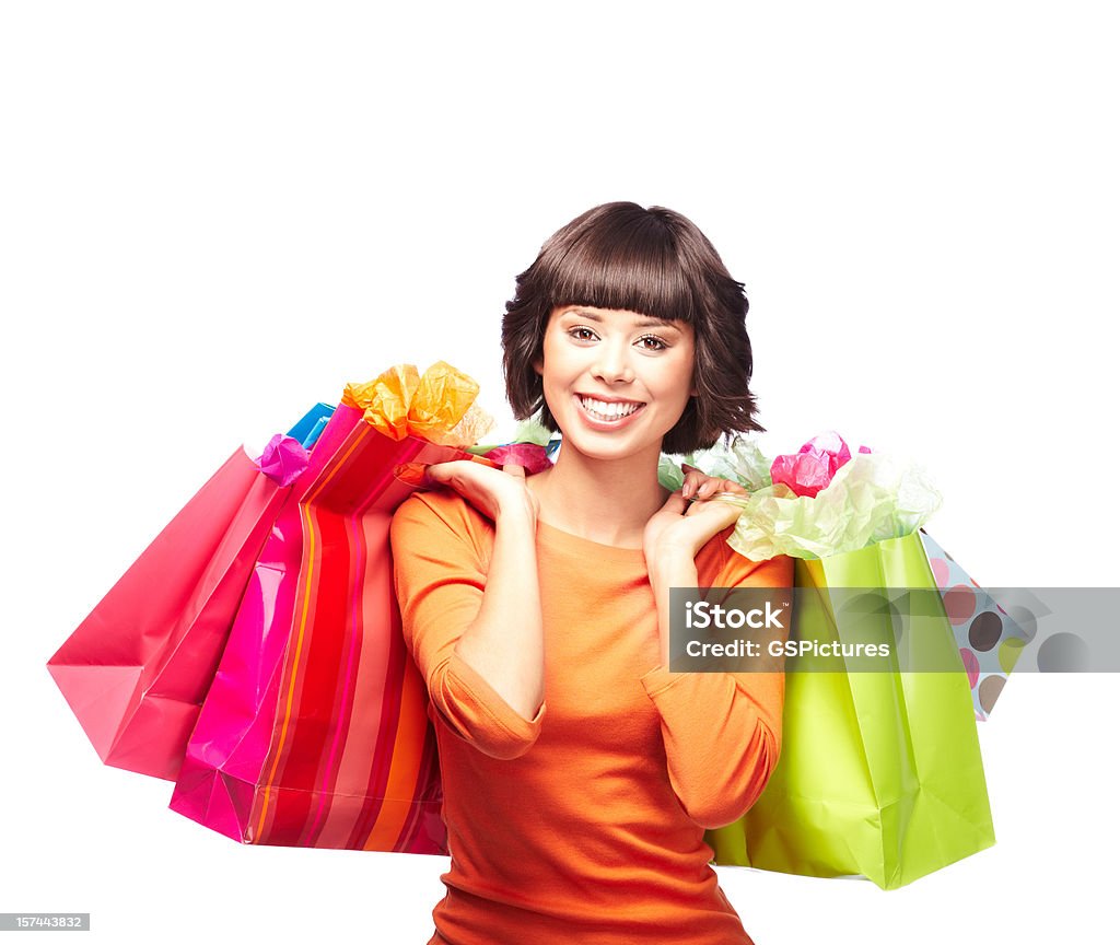 Atrakcyjna Młoda kobieta z torby na zakupy w ręce pełne - Zbiór zdjęć royalty-free (20-29 lat)