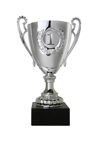 golden trophy against gray background