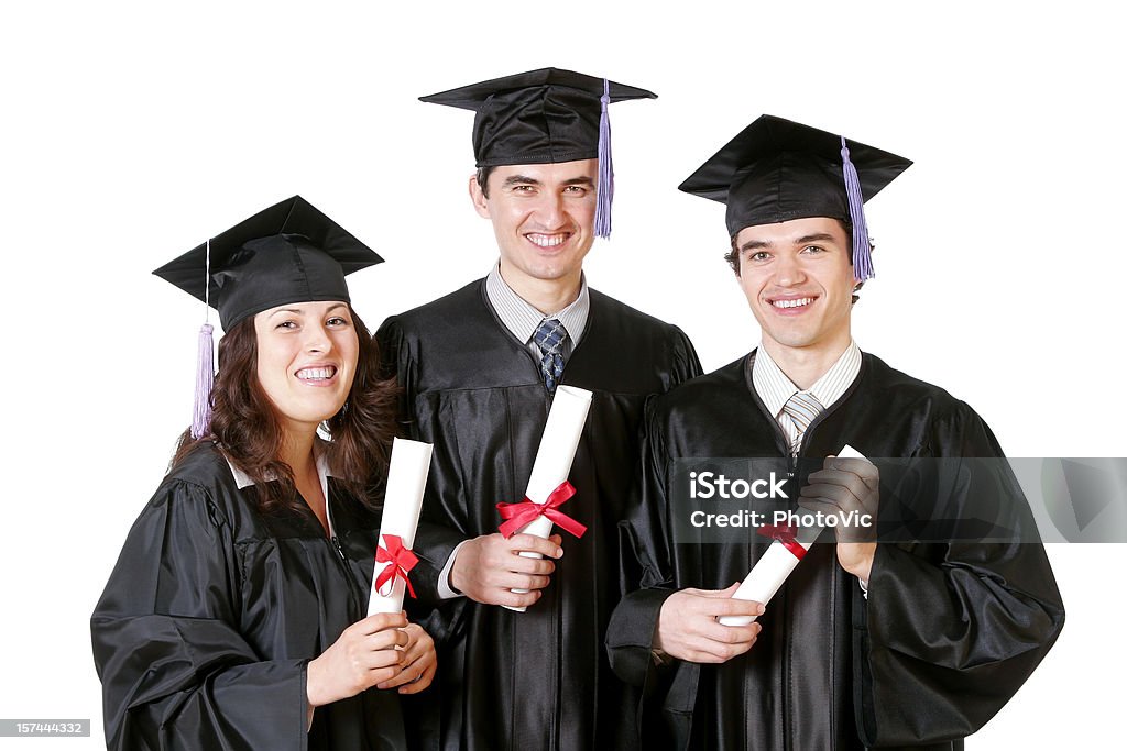 Три выпускников - Стоковые фото Академическая шапочка роялти-фри