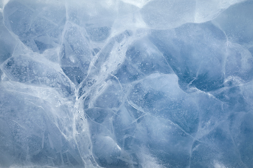 Beautiful frost pattern on a window with blurred background