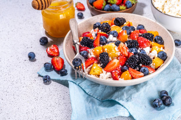 istock Summer fruit and berry salad with cottage cheese 1574471792