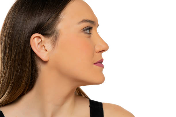 istock Profile of a young beautiful woman with makeup 1574475070