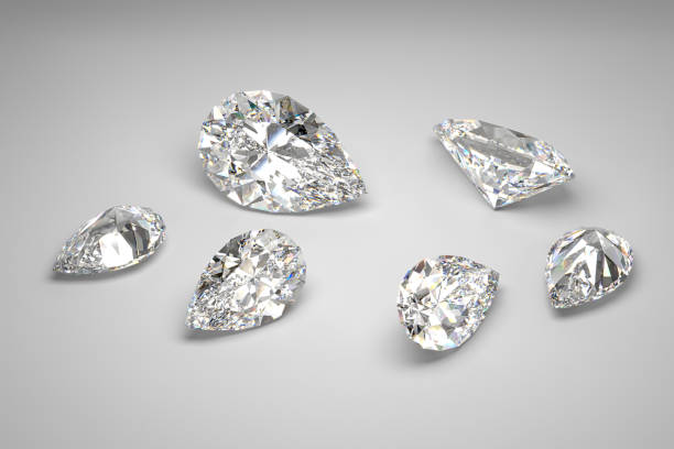 istock Scattering of diamonds of different sizes on a white background. Pear cut. 3d rendering. 1574483509