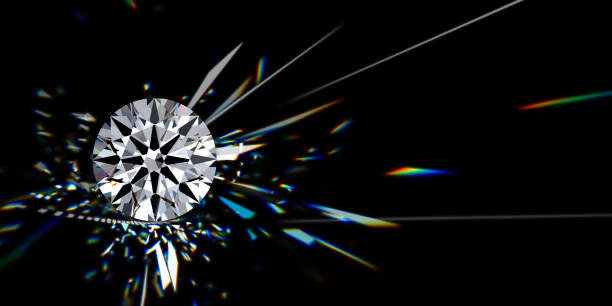 istock Round brilliant cut diamond with colorful fire and refraction rays on black background 1574500595