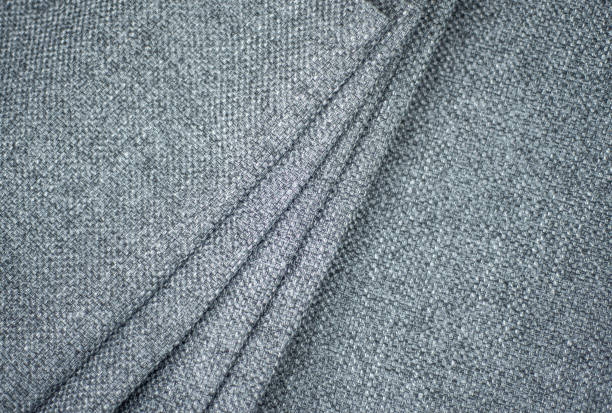 istock gray denim fabric layered with pleats for background 1574520111