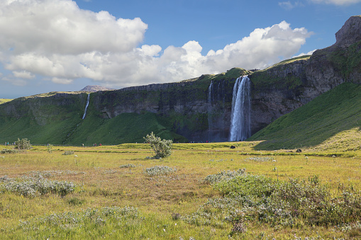 Southland, Iceland: - Seljalandsfoss is a waterfall in southern Iceland.You can walk behind the waterfall.