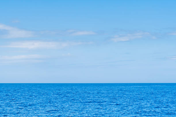 istock Blue sea and white clouds on sky. Water cloud horizon background Feeling calm, cool, relaxing, ocean 1574568542