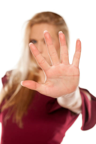 istock A young woman showing stop hand 1574682521