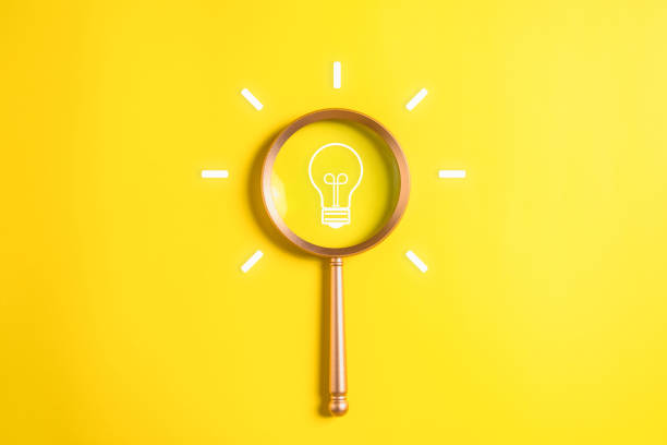 istock Light bulb icon with magnifying glass for creative idea thinking, Business strategy planning management, Business development, Survey and quality control assessment to achieve business goal 1574715070