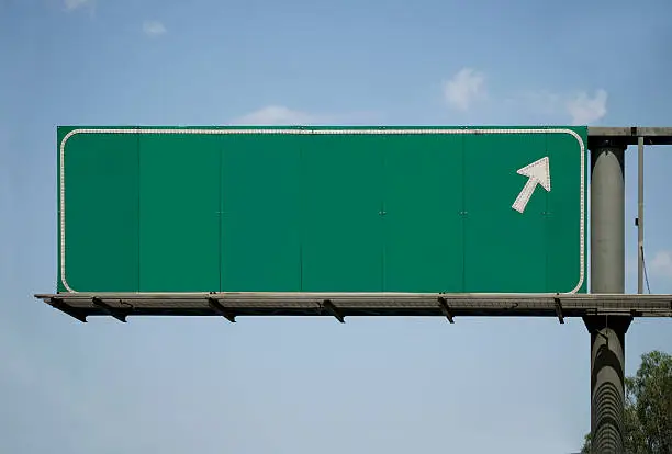 Photo of Blank Freeway Sign With Arrow