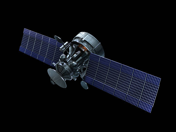 A satellite with blue solar panels on a black background stock photo