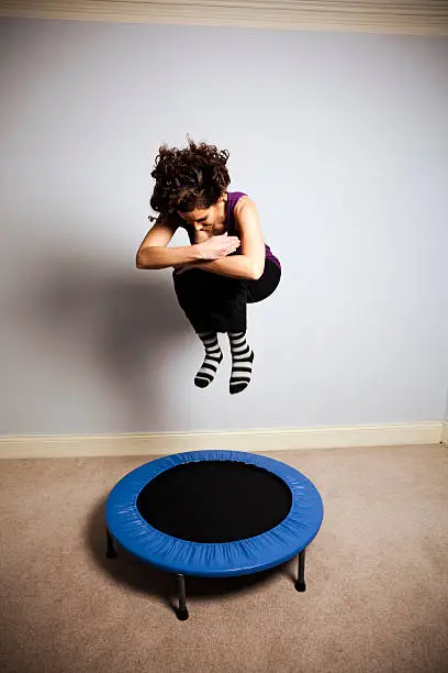 Photo of Gymnast on Trampoline