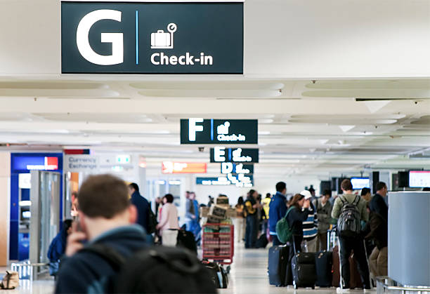 airport check-in area - self service stockfoto's en -beelden