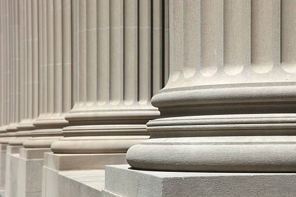 Low angle view of perfect white columns stock photo