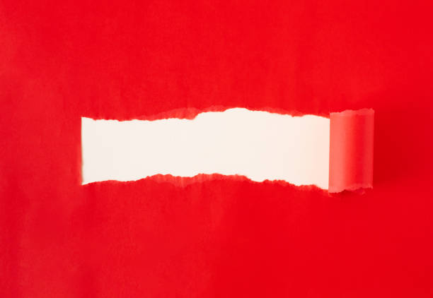 istock Red torn paper. Burst hole background. Minimal abstract colorful wallpaper concept. 1574750629