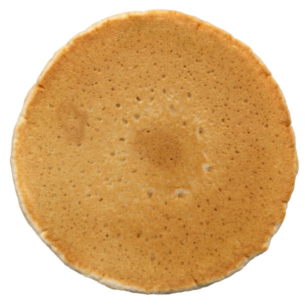 Studio shot of pancakes cut out against a white background