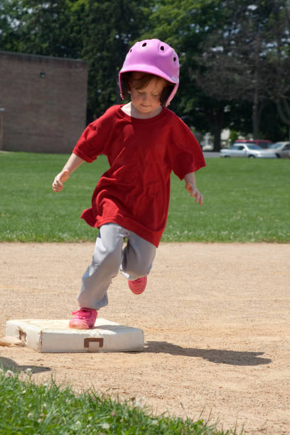 istock Young Girl Tags Base and Runs for Home 157475305