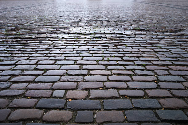 cobblestone background cobblestone backgroundcobblestone perspective cobblestone stock pictures, royalty-free photos & images