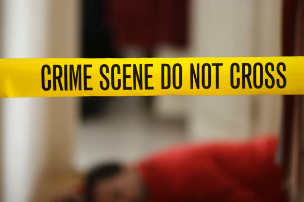 istock CSI: Murder victim and crime scene tape 157475987