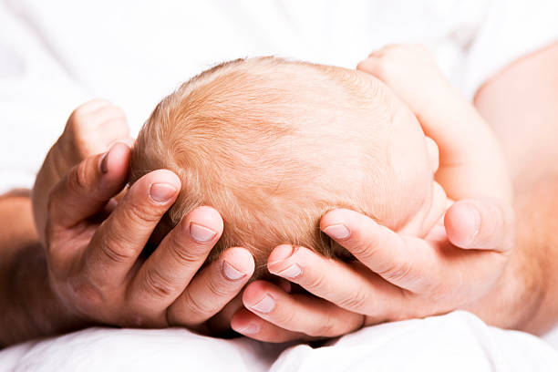 baby with mother