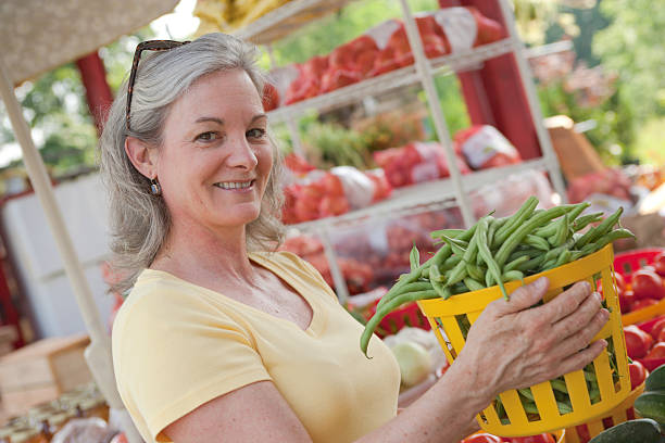 istock Woman shopping for vegetables (XXL) 157476057