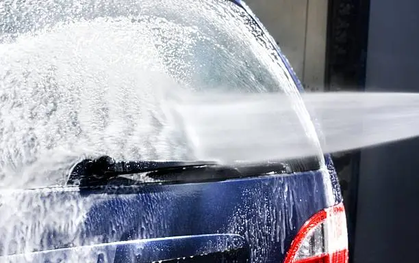 Photo of Washing a car with water pressure machine
