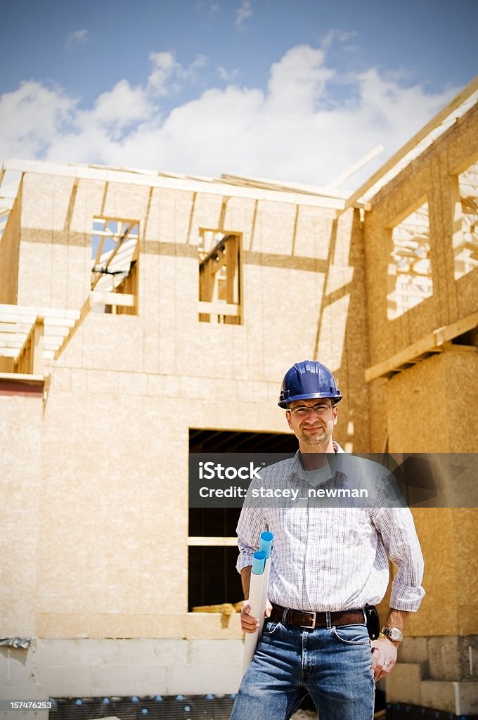 Ingeniero y Trabajador de construcción en sitio serie - Foto de stock de Accesorio de cabeza libre de derechos