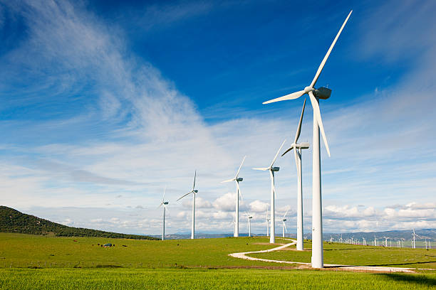 Wind Turbines Wind farm in the South of Spain. A wind turbine is a rotating machine which converts the kinetic energy in wind into mechanical energy. wind power stock pictures, royalty-free photos & images