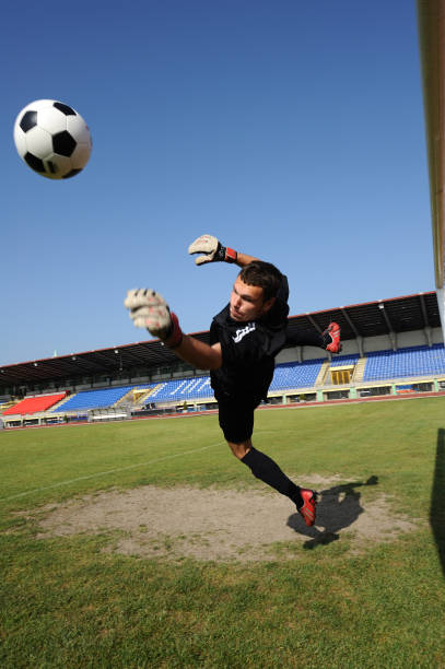 istock Soccer goalie defending 157476440