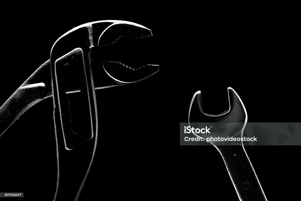 Wrench tools on black background  Adjustable Wrench Stock Photo