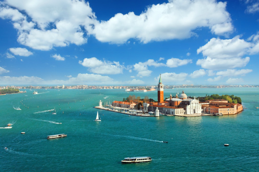 Venetian lagoon with ships and San Giorgio Maggiore aerial view