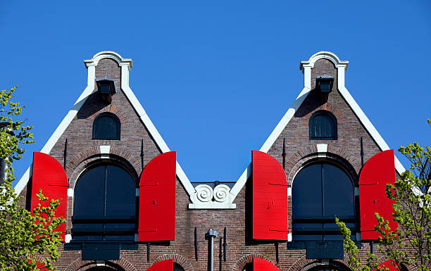 istock Red Shutters on Amsterdam Houses 157476794