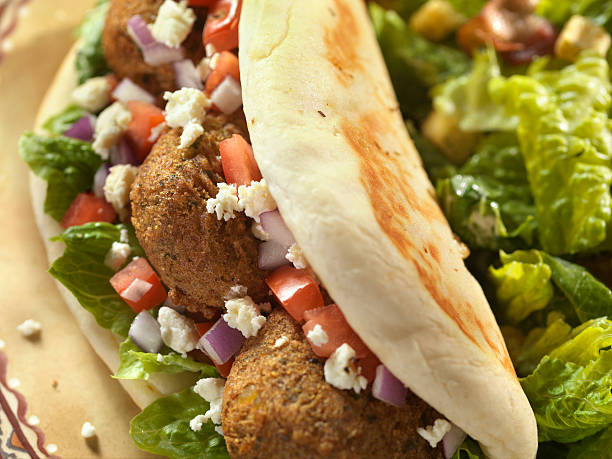 istock Falafel Wrap with Ceaser Salad 2 157477229