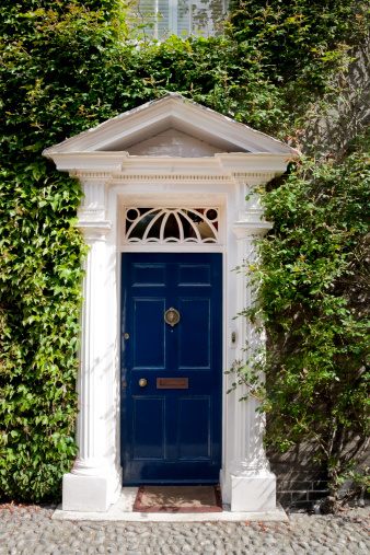 An elegant front door with a fanlight.