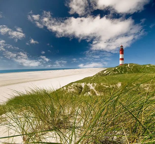 Lighthouse on a beach - Photomontage