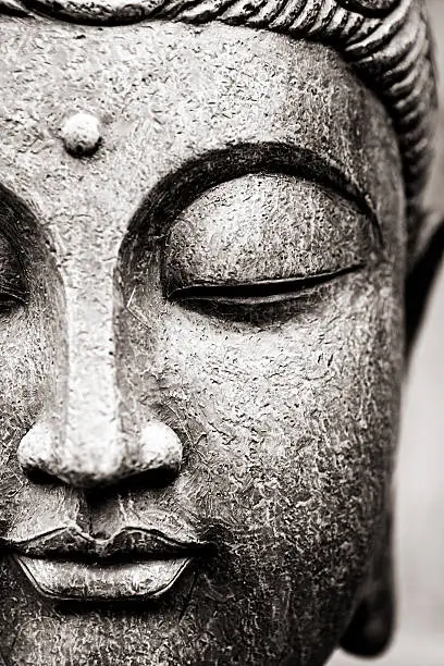 Close up view of generic Buddha's face. Taken in studio.