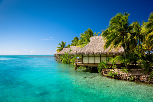 Bora Bora Tahiti travel honeymoon destination luxury resort holiday aerial landscape in French Polynesia. Blue.